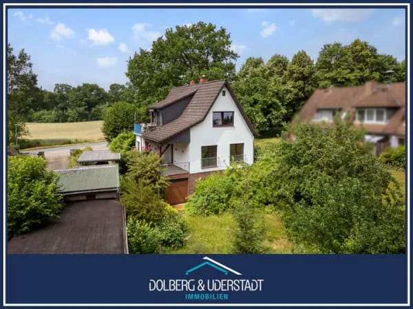Immobilie in Hoisdorf - Haus mit Einliegerwohnung, herrlichem Grundstück und viel Potential in ruhiger, naturnaher Lage - Bild 0
