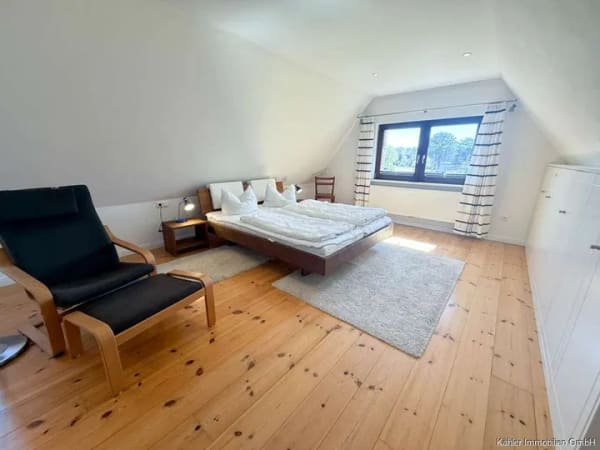 Immobilie in Sankt Peter-Ording - Vielseitiges Mehrfamilienhaus mit großzügigen Terrassen in attraktiver Lage von Sankt Peter-Ording B - Bild 2