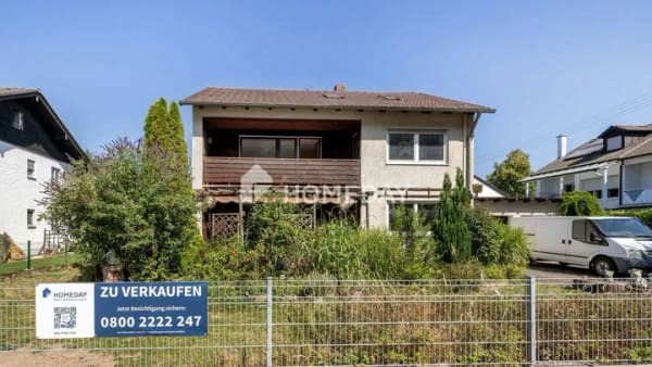 Immobilie in Kraiburg - Einfamilienhaus mit großem Grundstück und viel Potenzial in ruhiger Wohnlage - Bild 1