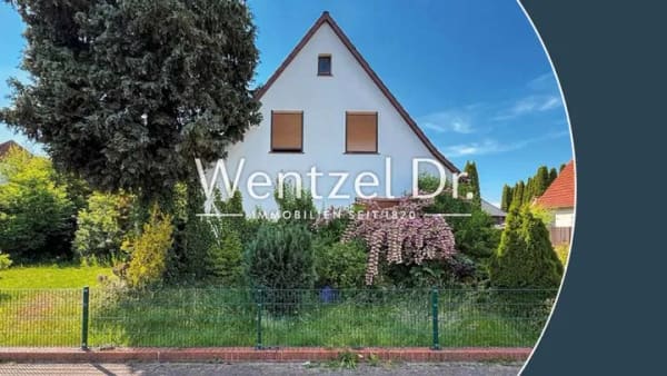 Immobilie in Tostedt - Sanierungsbedürftiges Einfamilienhaus auf schönem Eckgrundstück zum Kauf in Tostedt - Wentzel Dr. - Bild 1
