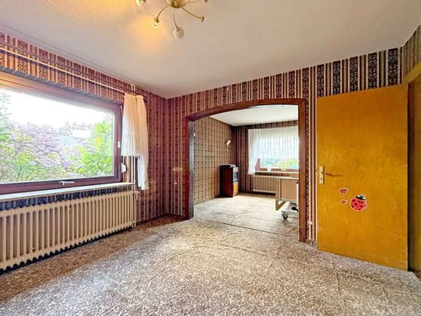 Immobilie in Tostedt - Sanierungsbedürftiges Einfamilienhaus auf schönem Eckgrundstück zum Kauf in Tostedt - Wentzel Dr. - Bild 4