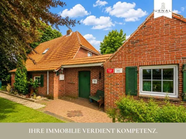 Immobilie in Großheide - Großheide: Landhaus mit großem Grundstück, Nebengebäude & viel Potenzial! - Bild 0
