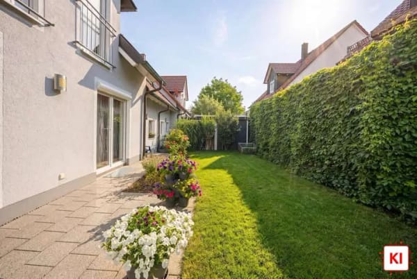 Immobilie in Adelzhausen - Modernes Einfamilienhaus mit Südwest-Terrasse, Kamin und Solaranlage - Bild 1