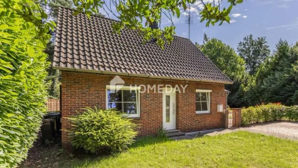 Immobilie in Hatten - Familienfreundliches Einfamilienhaus mit großem Grundstück und viel Potenzial in Hatten - Bild 0