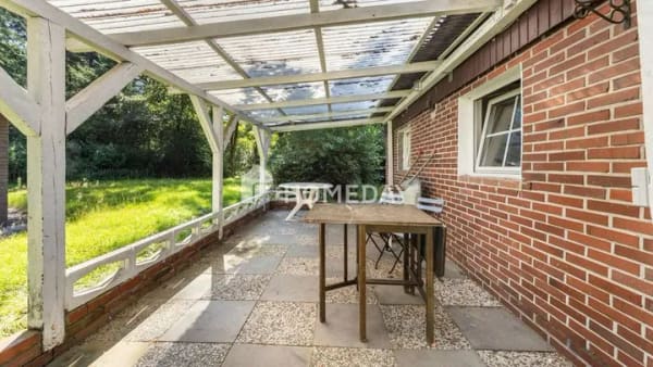 Immobilie in Hatten - Familienfreundliches Einfamilienhaus mit großem Grundstück und viel Potenzial in Hatten - Bild 4