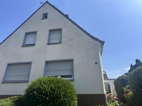 Immobilie in Jüchen - Vielseitige Immobilie mit drei abgeschlossenen Wohneinheiten & Keller - Bild 1