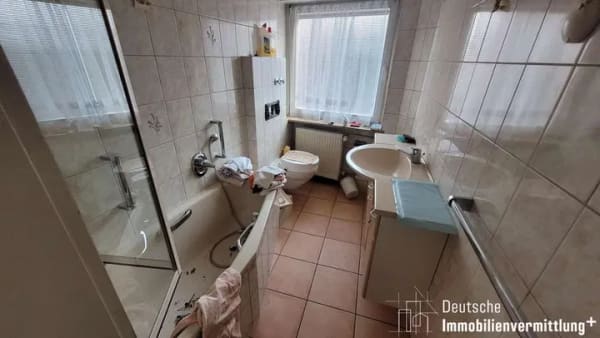 Immobilie in Hockenheim - Sanierungsbedürftiges 3-Familienhaus mit vermietetem Gewerbe - Bild 3