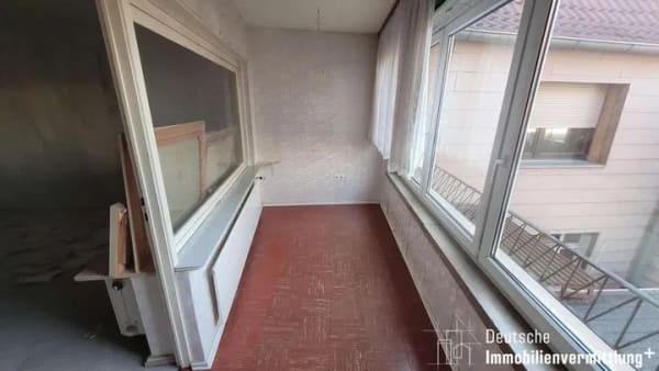 Immobilie in Hockenheim - Sanierungsbedürftiges 3-Familienhaus mit vermietetem Gewerbe - Bild 4