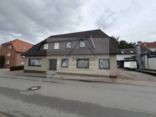 Immobilie in Bassum - Zweifamilienhaus mit Gewerbefläche zu verkaufen - Bild 3