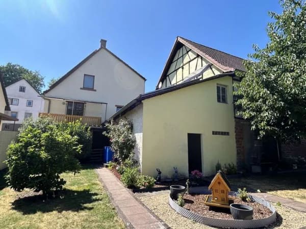 Immobilie in Leidersbach - Gemütlich wohnen: Gepflegtes Einfamilienhaus mit sonnigem Garten! - Bild 1