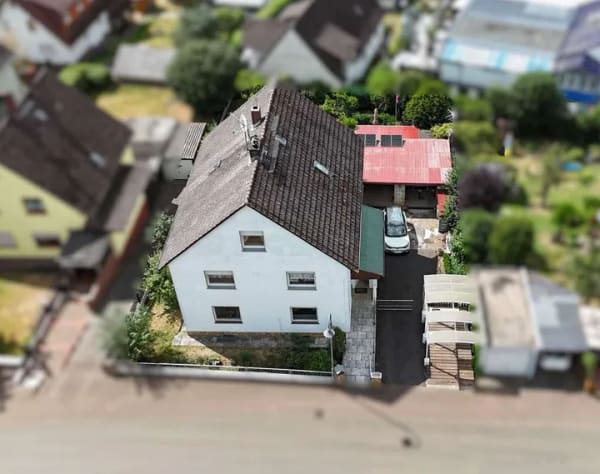 Immobilie in Gedern - Drei Wohnebenen, Wintergarten und Garten – Ideal für Familie oder Vermietung in Gedern-OT - Bild 1