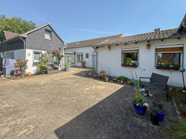Immobilie in Ratingen - Zwei Siedlungshäuser mit Zwischenbau - Bild 0