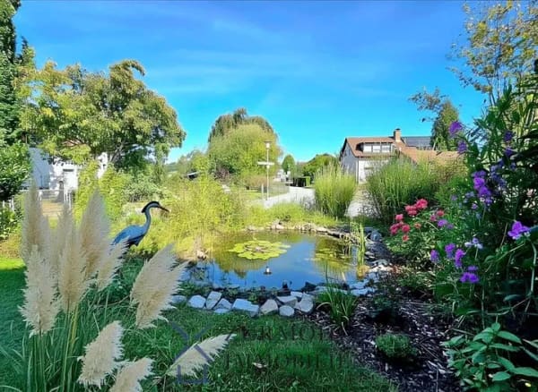 Immobilie in Binau - 190 m² flexibler Wohntraum in begehrter Lage: Großzügiges Zweifamilienhaus mit Garten und Südbalkon - Bild 1