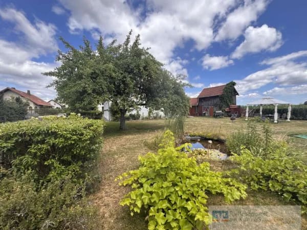 Immobilie in Speichersdorf - Sanierungsobjekt mit Potenzial: Zweifamilienhaus mit Ausbaureserve auf großem Grundstück - Bild 4