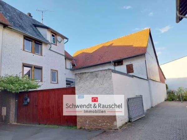 Immobilie in Langgöns - Einfamilienhaus mit Scheune und Garten in Langgöns-OT - Bild 0