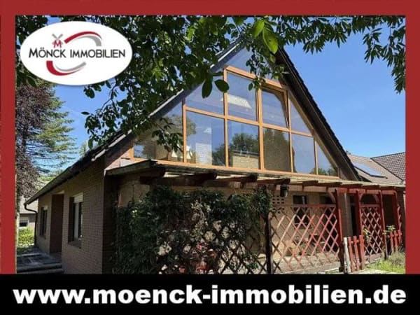 Immobilie in Hesel - Wohnhaus in idyllischer Lage mit Doppelgarage und Fittnessräumen im Keller - Bild 1