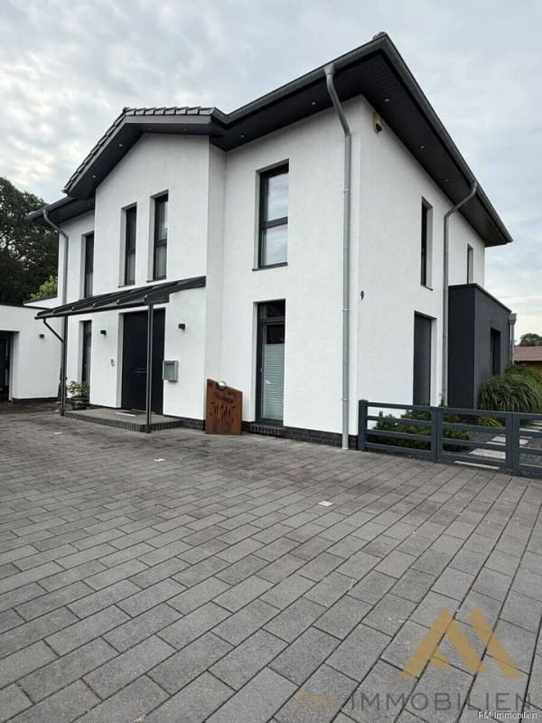 Immobilie in Molbergen - Exklusives modernes Designhaus mit Premiumausstattung, Doppelgarage und Photovoltaikanlage in Peheim! - Bild 1