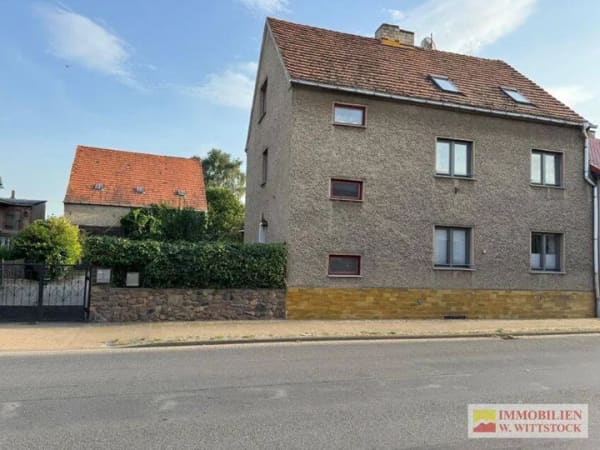 Immobilie in Putlitz - Haus mit Einliegerwohnung mit Großgarage und Garten in Putlitz - Bild 1