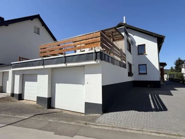 Immobilie in Schleiden - Geräumige, helle Eigentumswohnung (~ 90 m²) mit großer Dachterrasse, Balkon, Lagerräumen & Garage - Bild 3