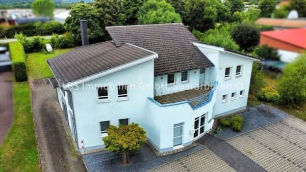Immobilie in Wadern - Wohnen mit Gewerbe - vielseitige Immobilie mit großem Grundstück und Entwicklungspotenzial - Bild 1