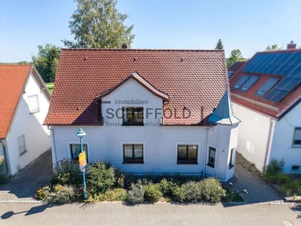 Immobilie in Bad Buchau - Ihr neues Zuhause! Gemütliches Einfamilienhaus mit durchdachtem Grundriss &  schönem Sommergarten - Bild 1