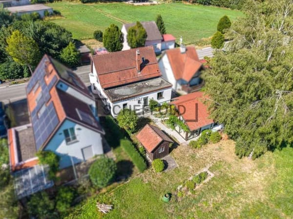 Immobilie in Bad Buchau - Ihr neues Zuhause! Gemütliches Einfamilienhaus mit durchdachtem Grundriss &  schönem Sommergarten - Bild 3