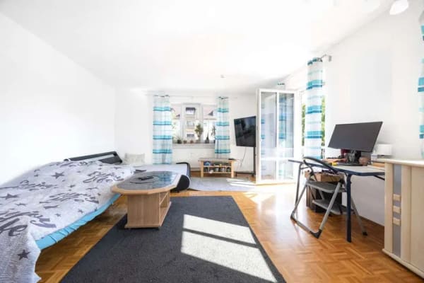 Immobilie in Garching an der Alz - Vermietete 2-Zimmer-Wohnung mit Balkon & Tiefgaragenstellplatz - Bild 2