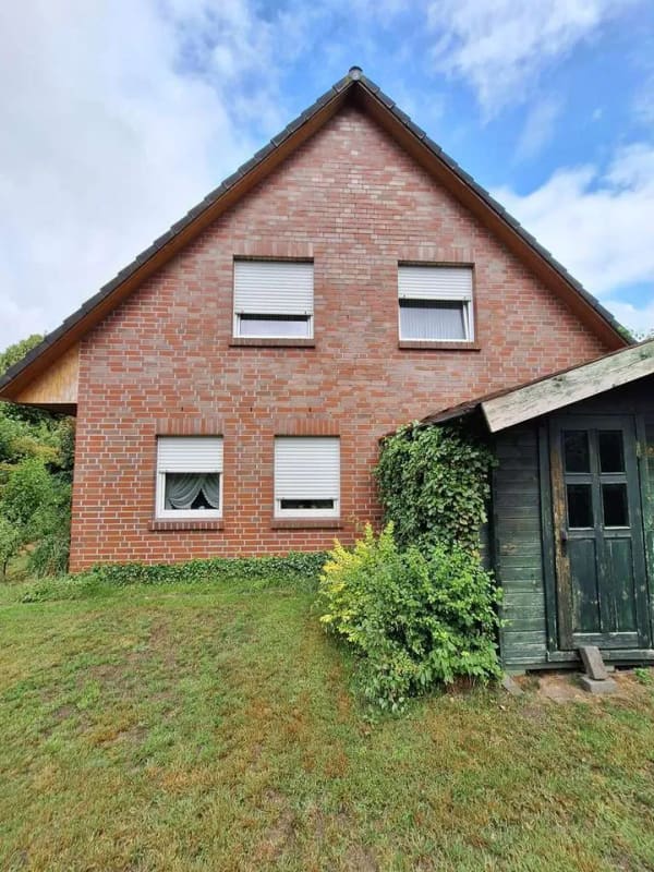 Immobilie in Hatten - 5-Zimmer-Einfamilienhaus mit Garage, Carport und großem Grundstück in ruhiger Sackgassenlage - Bild 3