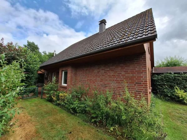 Immobilie in Hatten - 5-Zimmer-Einfamilienhaus mit Garage, Carport und großem Grundstück in ruhiger Sackgassenlage - Bild 4