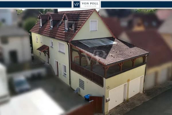 Immobilie in Obernbreit - Einfamilienhaus mit großzügigen Räumen und zwei Garagen - Bild 0