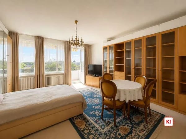 Immobilie in München - Renovierungsbedürftige, vermietete 1-Zimmer-Wohnung mit großem Balkon und Hallenbad - Bild 1