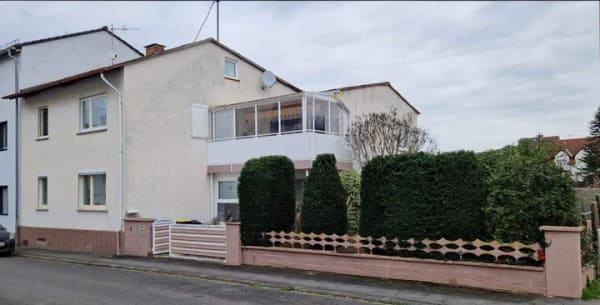Immobilie in Idstein - Ein- oder Zweifamilienhaus mit Garten, Garage und Wintergarten  - Bild 1