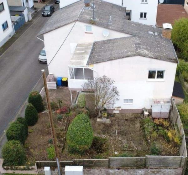 Immobilie in Idstein - Ein- oder Zweifamilienhaus mit Garten, Garage und Wintergarten  - Bild 2