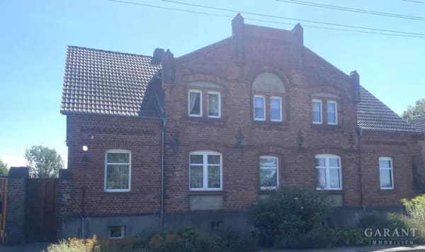 Immobilie in Wanzleben-Börde - Großes Einfamilienhaus mit großem Garten, Einliegerwohnung, einer Halle & Garage - Bild 0