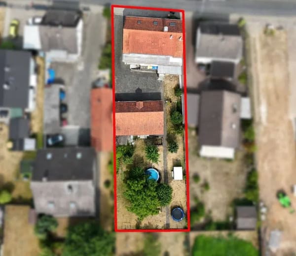 Immobilie in Hasselroth - Familienfreundliches Mehrfamilienhaus mit Bauplatz in Hasselroth - Bild 3