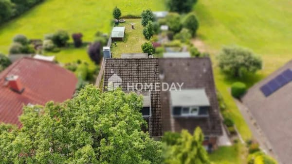 Immobilie in Itzstedt - Wohnen mit Weitblick - Doppelhaushälfte auf großzügigem Grundstück mit Wintergarten - Bild 1