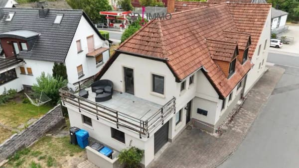 Immobilie in Waxweiler - Großzügige Eigentumswohnung über zwei Etagen mit Terrasse und Ausbaureserve - Bild 0