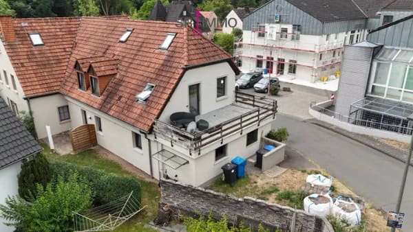 Immobilie in Waxweiler - Großzügige Eigentumswohnung über zwei Etagen mit Terrasse und Ausbaureserve - Bild 2