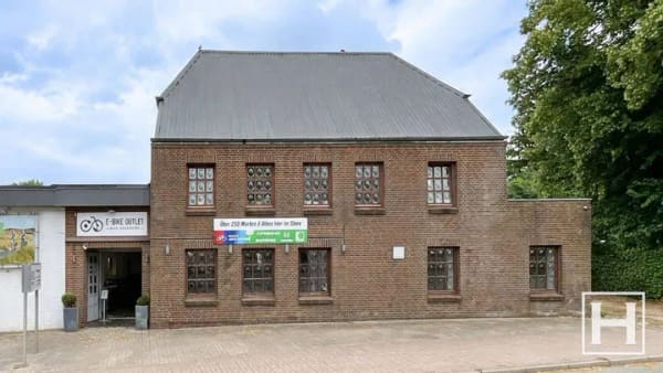 Immobilie in Klein Gladebrügge - Modernes Wohn- und Geschäftshaus - Bild 0