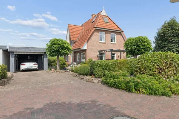 Immobilie in Lüdersburg - Stilvoll wohnen in Lüdersburg - Feldrandlage, Sauna und zwei Carports - Bild 1