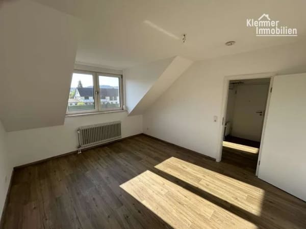 Immobilie in Marktheidenfeld - Modernisierte Dachgeschosswohnung mit Balkon in attraktiver Lage von Marktheidenfeld - Bild 1