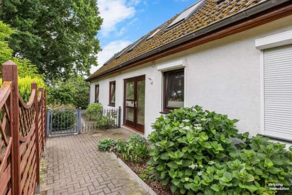 Immobilie in Oyten - Oyten – Süd | Vermietete 4-Zimmer-Erdgeschosswohnung mit Südgarten - Bild 1
