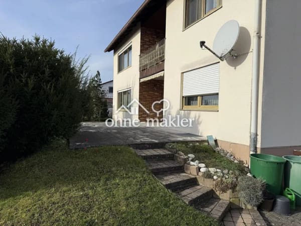 Immobilie in Uehlfeld - Großzügiges 2-/3- Familienhaus in ruhiger Lage mit flexiblen Nutzungsmöglichkeiten - Bild 2