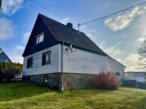 Immobilie in Birken-Honigsessen - Kompaktes Einfamilienhaus mit sep. Garagengebäude - Bild 0