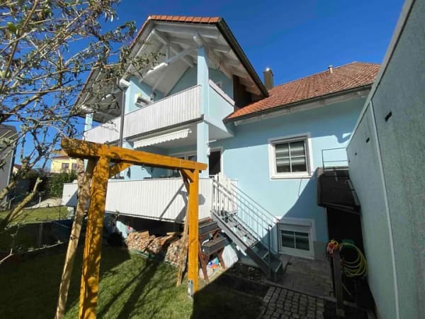 Immobilie in Kösching - 4-Zimmer-Wohnung in Kösching-Eixelberg mit Balkon und Garten - Bild 0
