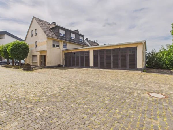 Immobilie in Emmelshausen - Mehrfamilienhaus/Gewerbeeinheiten im Zentrum von Emmelshausen zu verkaufen. - Bild 0