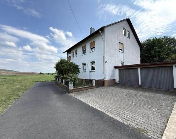 Immobilie in Rauhenebrach - Zweifamilienhaus mit Ausbaureserve und großem Grundstück - Bild 0