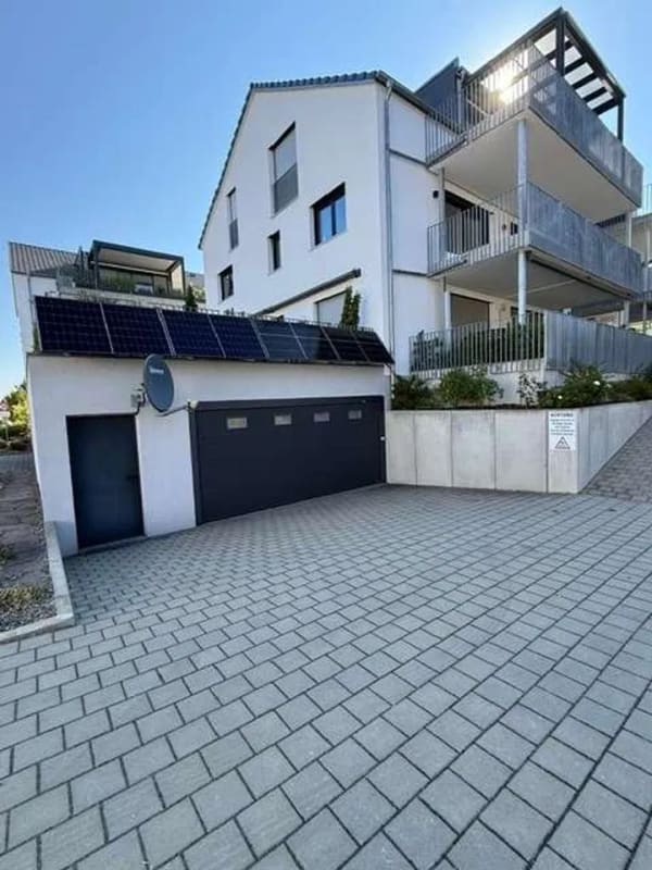 Immobilie in Moos - Attraktive Erdgeschosswohnung mit großer Terrasse und Tiefgarage in Moos-Weiler - Bild 1