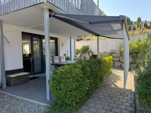 Immobilie in Moos - Attraktive Erdgeschosswohnung mit großer Terrasse und Tiefgarage in Moos-Weiler - Bild 2