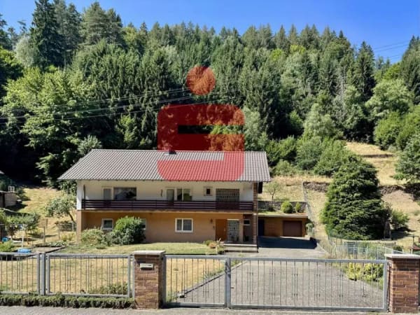 Immobilie in Elmstein - Gepflegtes Einfamilienhaus mit großem Grundstück, Garten und zwei Garagen - Bild 0
